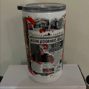 Jason Voorhees Horror Tumbler with Newspaper Design and Red Blood Splatters